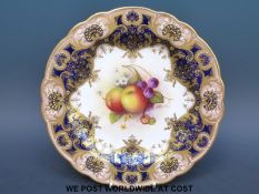 A Royal Worcester jewelled cabinet plate decorated with painted fruit by A.