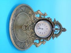 A continental silver fob watch on a brass stand