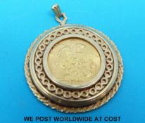 A yellow metal pendant set with a 1974 gold full sovereign (14.