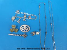 A group of silver jewellery including a brooch and kilt pin with Edinburgh hallmarks,