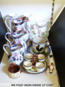 A set of three graduated jugs, Torquay ware, Royal Doulton character dog etc.