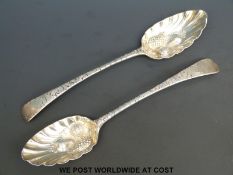 Two hallmarked silver Georgian berry spoons,