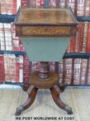 A Regency inlaid rosewood work box raised on four brass gnarled feet and castors (width 42cm,