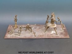 A large bronze and brass Ashanti tribal scene made up of metal figures (52 x 20cm,