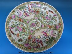 A late 19th / early 20thC Chinese famille rose charger with decoration to front and reverse,