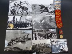 A collection of Russian militaria including photos, medal,