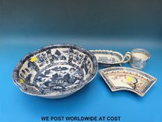 A large blue and white bowl, a Kangxi dish,