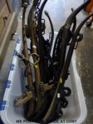 A quantity of horse hames and other frames including brass example with horse trademark