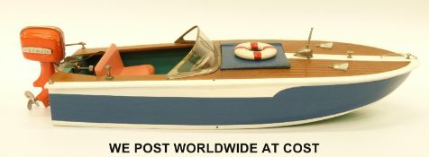 TMY K&O KMK, Japan, wooden model of a boat with electric motor, 45cm long, in original box.