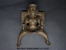 An Indian or similar bronze god,