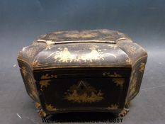 A Chinese lacquer tea caddy with a two-division pewter interior (22cm long)