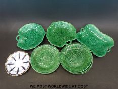 A quantity of Wedgwood majolica plates and dishes and two Royal Crown Derby plates