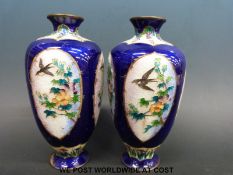 A pair of Japanese cloisonne ginbari pedestal vases with bird and floral decoration (19cm tall)