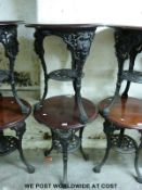 Two mahogany and cast iron pub tables (H70cm,