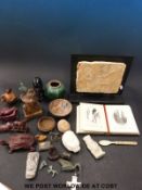 A quantity of Egyptian and Eastern style decorative carvings