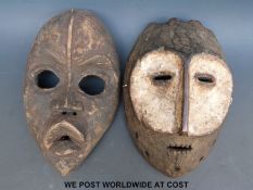 Two African tribal masks (largest 25cm)