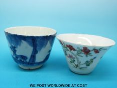 An early Chinese blue and white tea bowl and a 19thC Chinese famille verte tea bowl (tallest 4.
