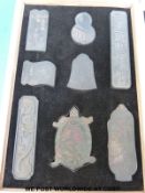 Thirty four Chinese Republic period ink sticks / blocks in four fitted cases