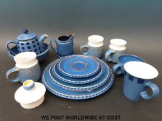 A set of Denby teaware for one, including teapot, dinner plate, tea plate and side plate,