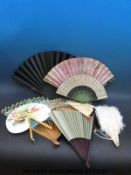 A collection of vintage fans including carved bone and feather, Chinese, hand painted examples etc.