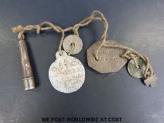 A pair of WWI military dog tags stamped 3 S T.P Dyson-Hughes A.A.M.C to one and 1.IH.F.A A.1.F.C.