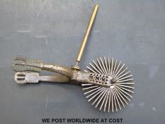 An Eastern spur with Damascene decoration and buckle fittings