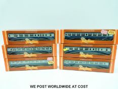 Seventeen Hornby 00 gauge carriages and wagons, all in original boxes.