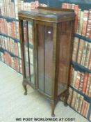 A glass display cabinet (W58cm)