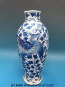 A 19thC Chinese blue and white vase with six character mark to base (23.
