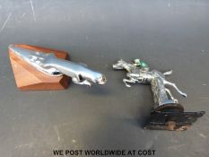 A Jaguar car mascot (overall length 17cm) and a horse and jockey mascot,