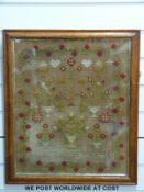 An 1873 wool sampler (41 x 49cm) and a framed 19thC map of Jamaica