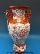 A large twin handled Japanese Kutani pedestal vase, signed to base (33.
