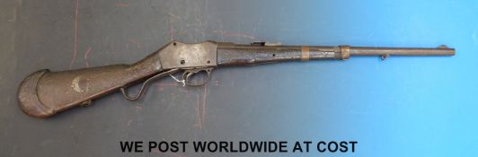 A Birmingham made Martini-Henry action rifle with heavily inlaid stock,
