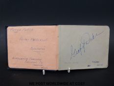An autograph album of famous motorcyclists, to include Geoff Duke, Geoff Ward,