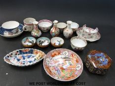 A collection of 18th/19thC and later Chinese and Japanese tea bowls and saucers, vases,