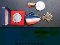 A WWI medal pair awarded to 120577 Cpl A Sutherland RE, a 1935 Silver Jubilee token,