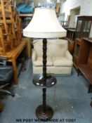 A barley twist standard lamp with integral shelf (H164cm)