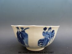 A Chinese blue and white porcelain bowl decorated with figures/scholars,