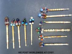 Eleven 19thC carved bone bobbins including love tokens / marriage examples