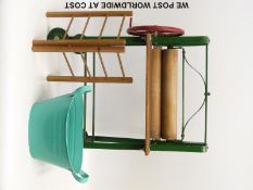 A c1960s doll's washing mangle on wheels together with a clothes airer and washing bucket