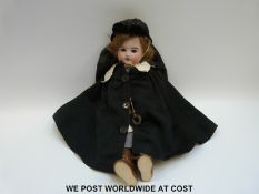 Societe de Fabrication des Bebes et Jouets (SFBJ) bisque headed doll with weighted brown eyes,