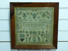 A George IV sampler by Mary Miller 1829 (31 x 31.
