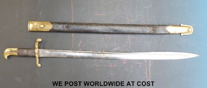 A brass hilted Lancaster 1855 pattern bayonet, 61cm blade,