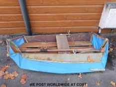 A collapsible boat / dinghy with seat,