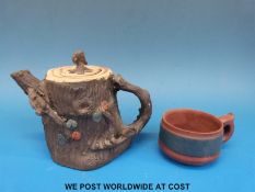 A Chinese Yixing teapot in the form of a tree and a small Yixing cup