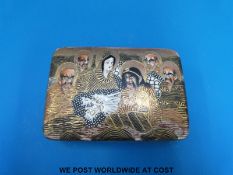 A Japanese Meiji period Satsuma lidded pot decorated with warriors and immortals,