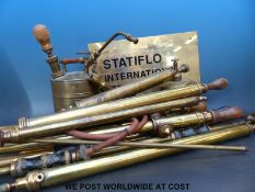 A collection of early 20thC century brass garden sprayers etc and a Pri-mus brass blow torch