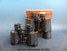 Two pairs of binoculars,