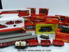 Twenty-six Hornby 00 gauge locomotives, carriages and wagons,