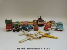 Twelve Corgi and eight Dinky diecast model vehicles, including two aircraft,